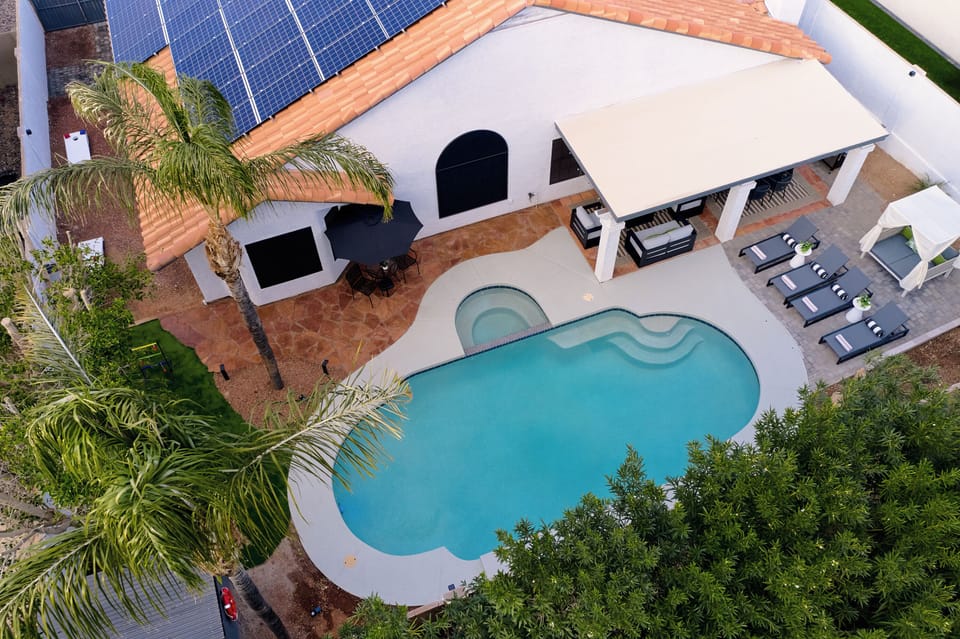 Backyard: Heated Pool and Built-In Hot Tub. Press Play