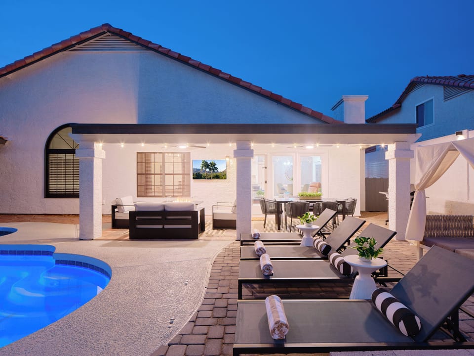 Backyard: Soak in the warm AZ rays on 4 loungers