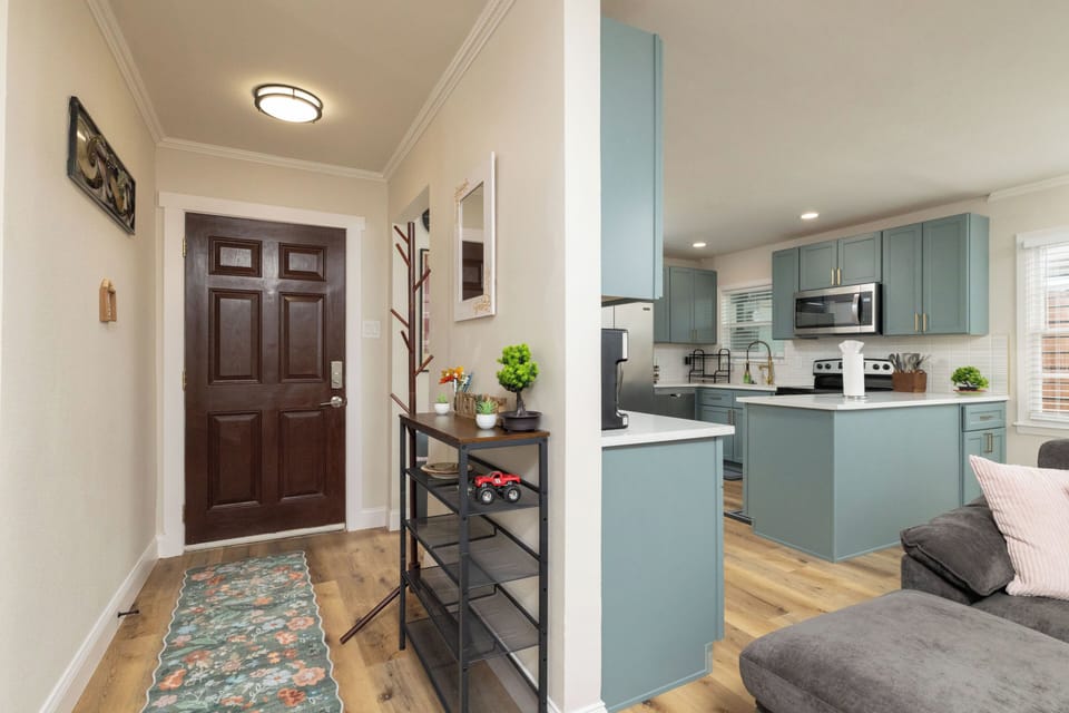 Modern kitchen with stainless appliances & a spacious island—perfect for cooking
