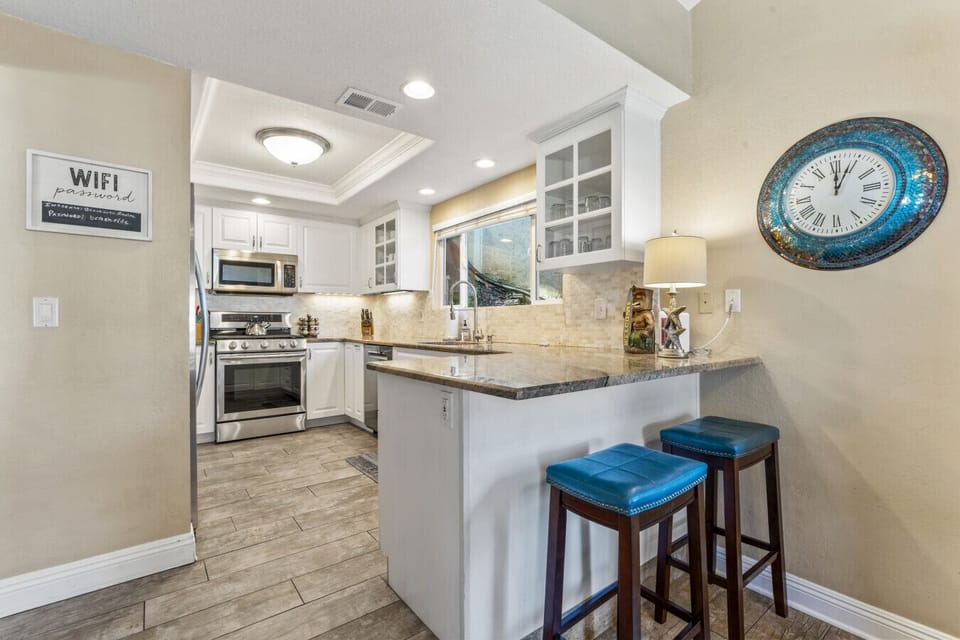 Fully equipped kitchen with stainless appliances