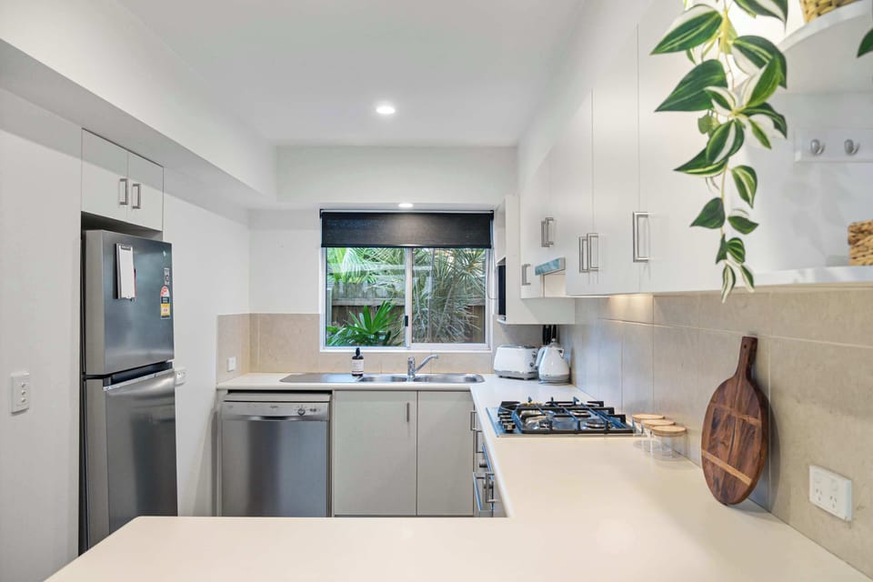 Fully equipped kitchen with gas stovetop. 