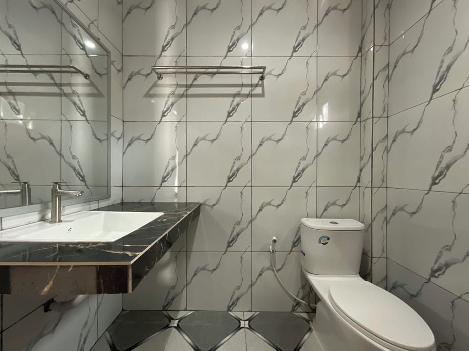 Family Quadruple Room, Balcony | Bathroom | Shower, towels, soap, shampoo