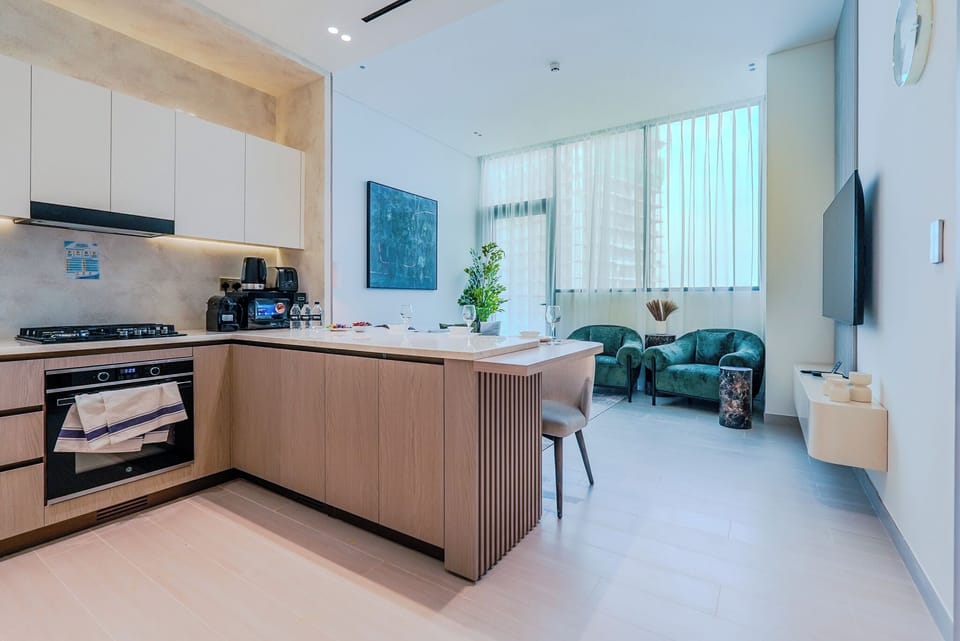 Deluxe Apartment, Balcony, City View | Living area | 55-inch Smart TV with digital channels