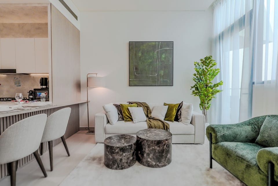 Deluxe Apartment, Balcony, City View | Living area | 55-inch Smart TV with digital channels