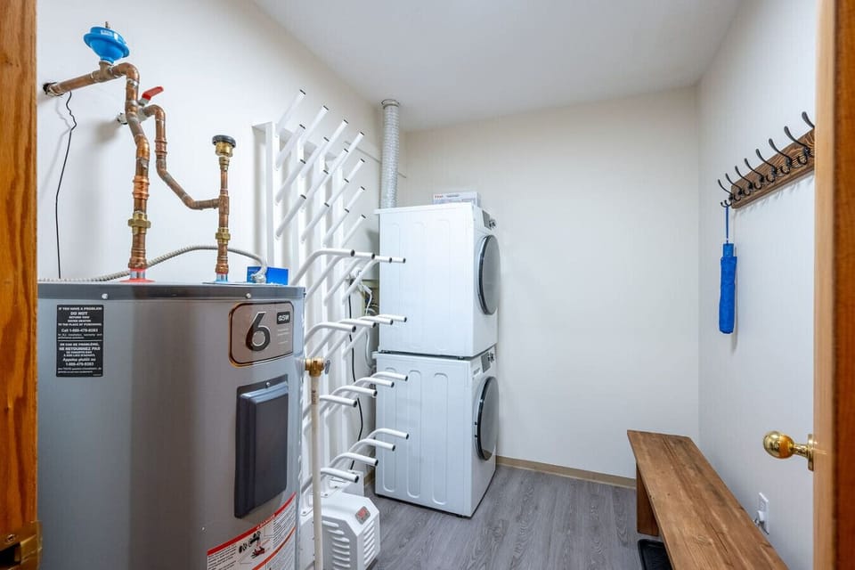 Convenient in-suite laundry room with a full washer/dryer and plenty of storage for gear for guests.