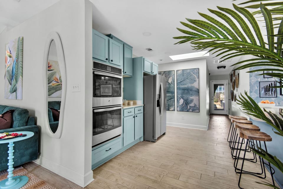 Kitchen features high-end modern appliances.
