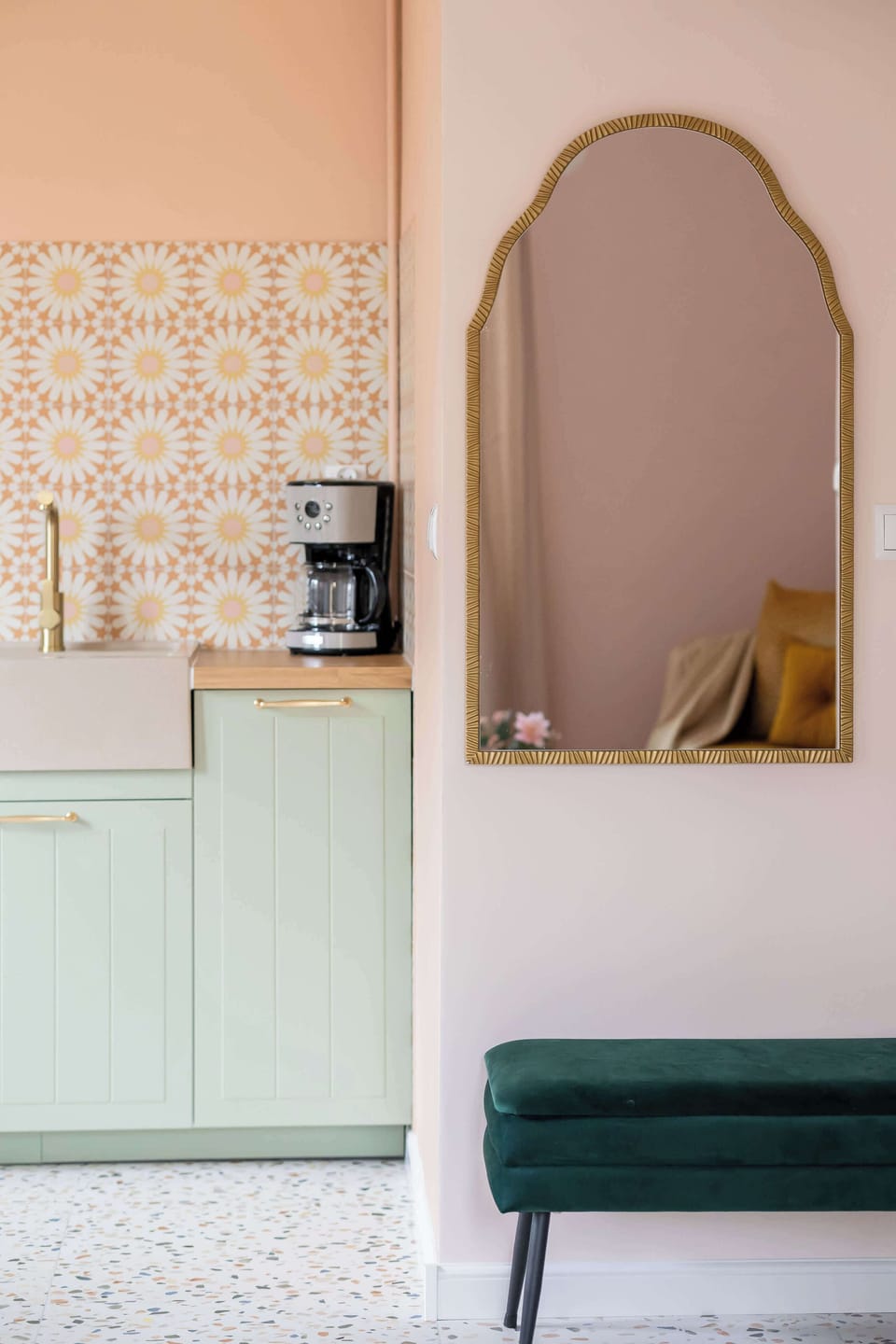 Stylish interiors with elegant accessories. An elegant mirror hangs on the wall.