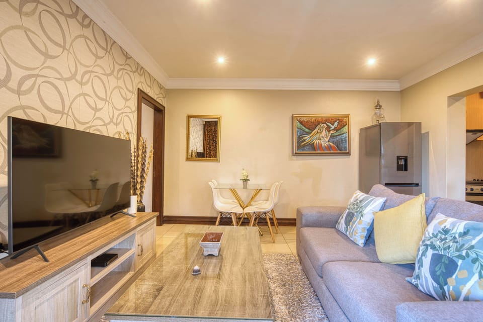 Light-filled living and dining space designed for easy group living