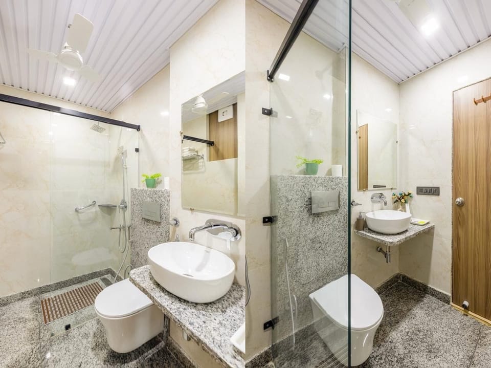 Deluxe Double Room, City View | Bathroom | Shower, hair dryer, towels, soap