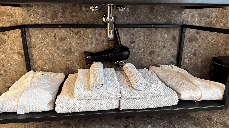 Shower, towels, soap, shampoo