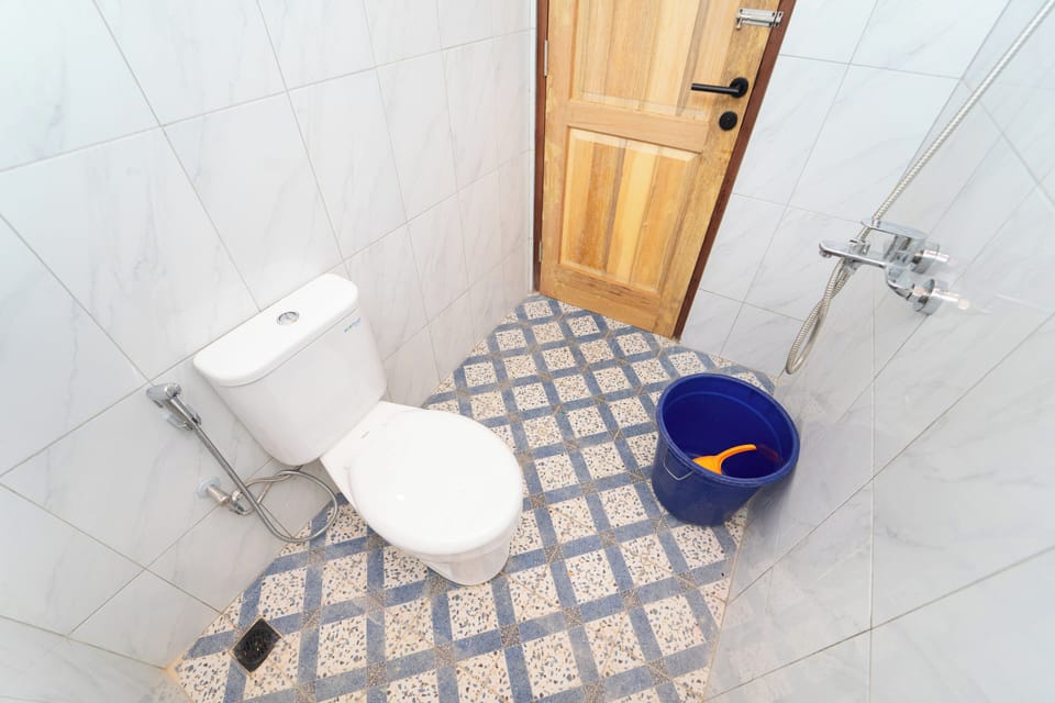 Standard Double Room | Bathroom | Shower, towels, soap, toilet paper