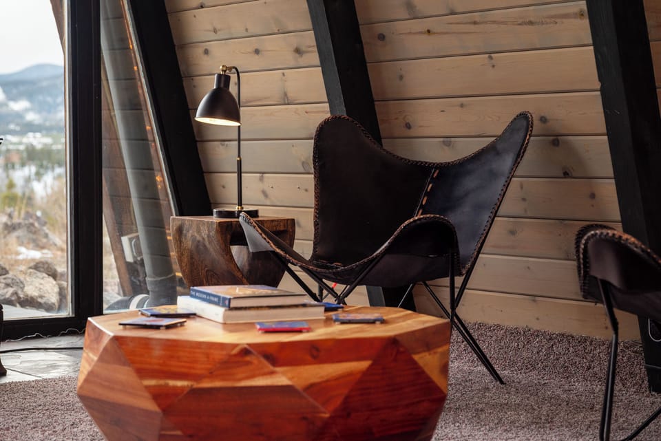 Settle into your cozy reading nook with a good book and mountain views through expansive windows.