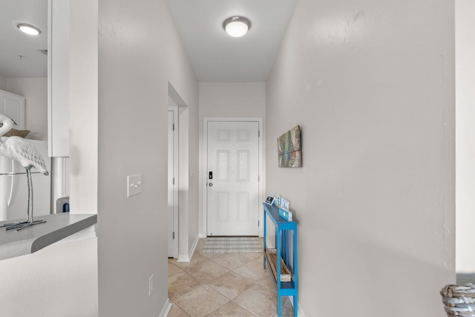 You'll love the bright, welcoming entryway with modern tile floors and thoughtful touches that make you feel at home instantly.