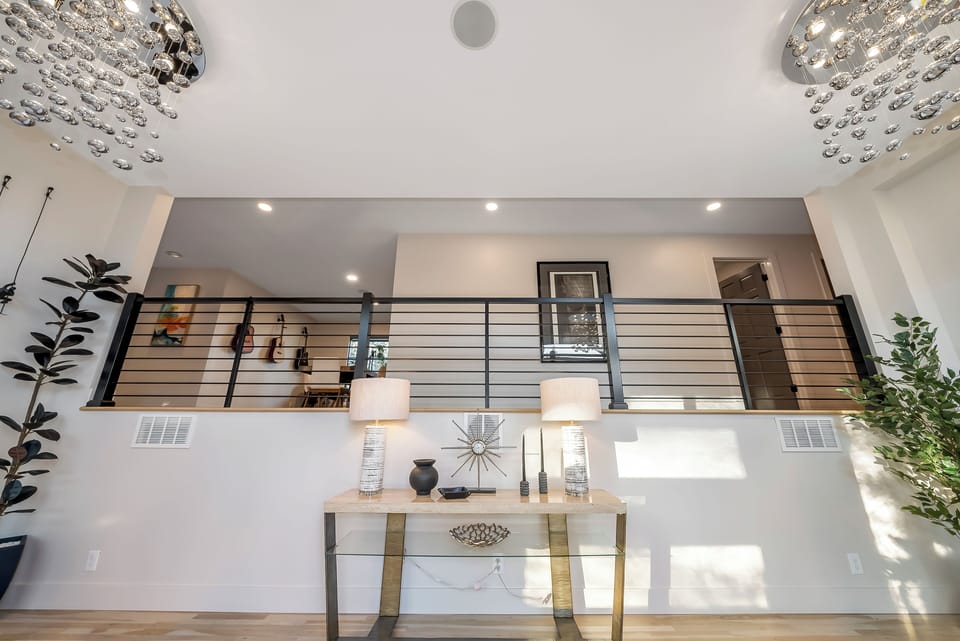 Step into your elegant retreat where crystal chandeliers and soaring ceilings create an atmosphere of luxury and sophistication.