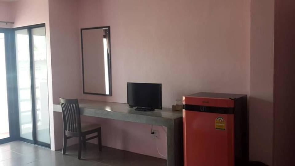 Desk, blackout drapes, rollaway beds (surcharge), WiFi (free)