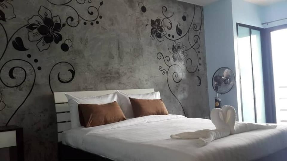 Desk, blackout drapes, rollaway beds (surcharge), WiFi (free)