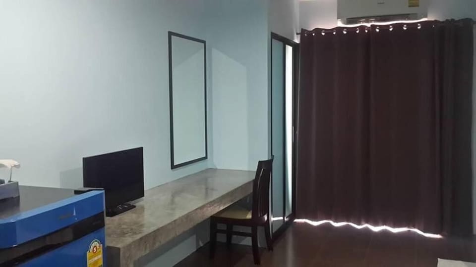 Desk, blackout drapes, rollaway beds (surcharge), WiFi (free)