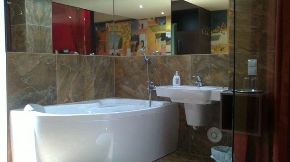 Standard Double Room | Bathroom | Shower, hair dryer, towels, soap