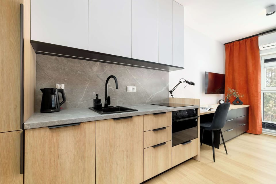 The fully equipped kitchenette includes everything you need for a home-cooked meal.