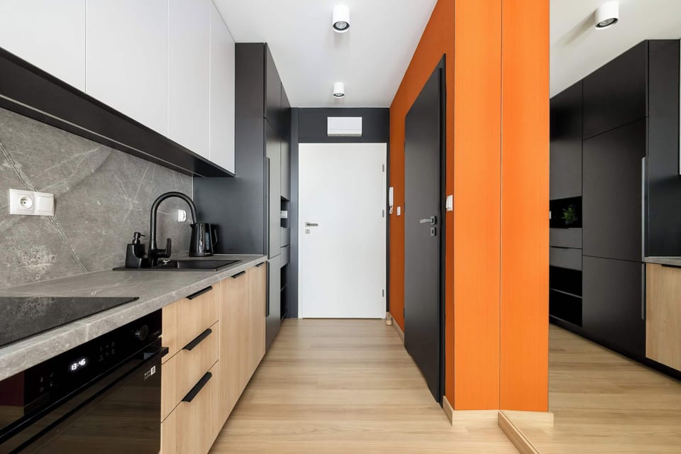 The fully equipped kitchenette includes everything you need for a home-cooked meal.