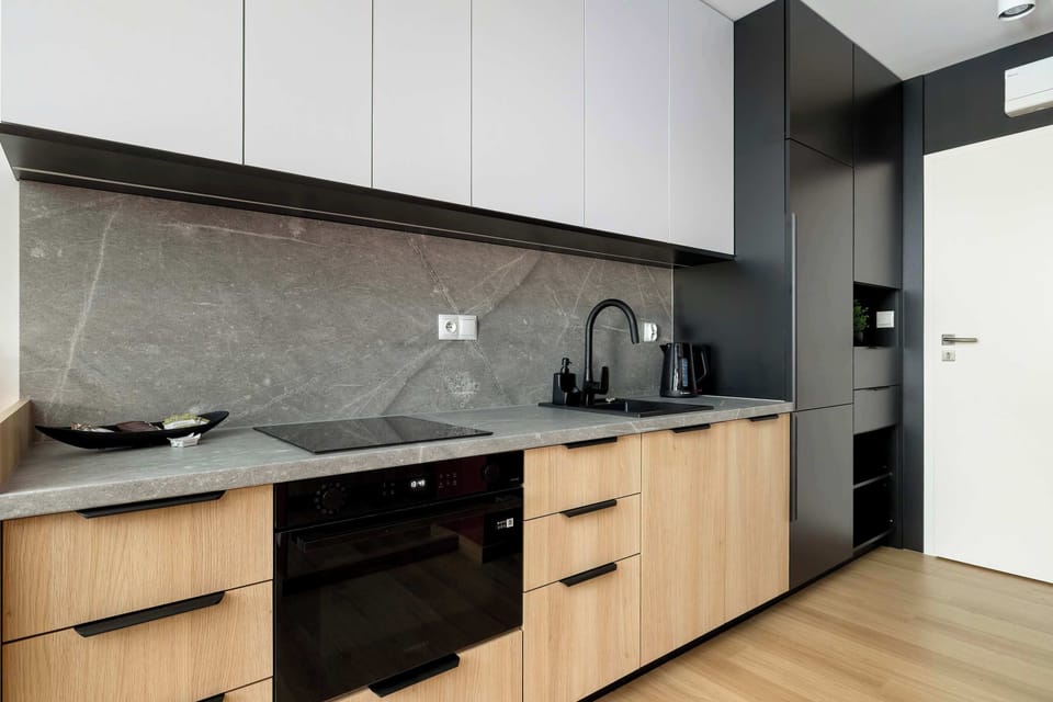 The kitchenette's practical layout maximizes space and functionality.
