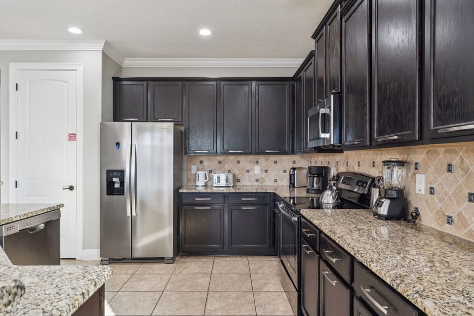 Spacious kitchen with ample cabinets for all your storage needs.