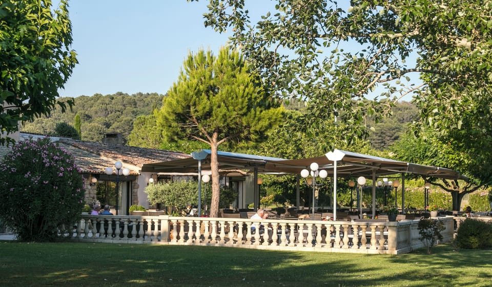 Lunch, dinner served; French cuisine, garden views 
