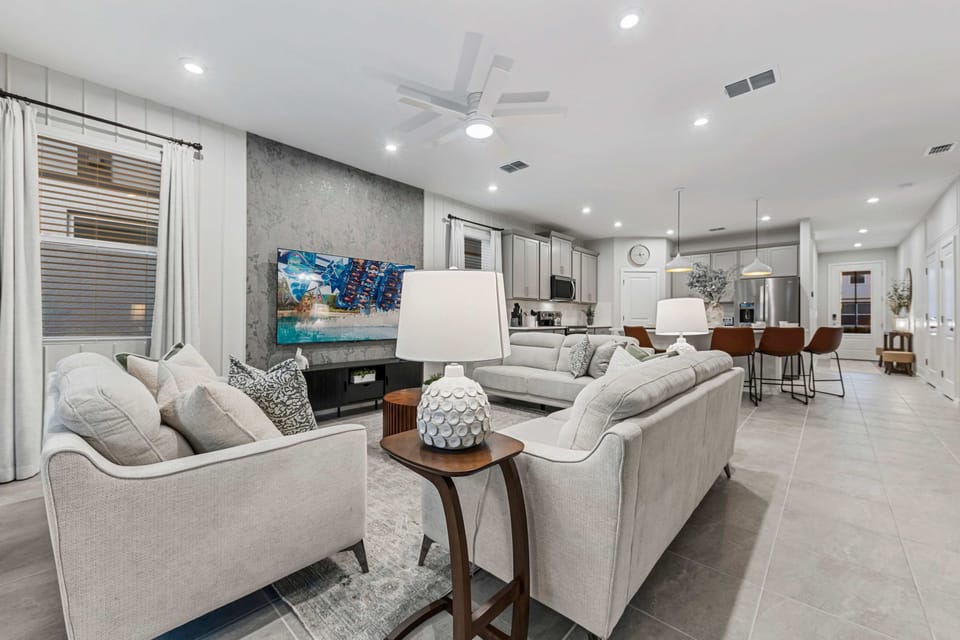 Modern and comfortable lounge area—perfect for movie nights and family time.