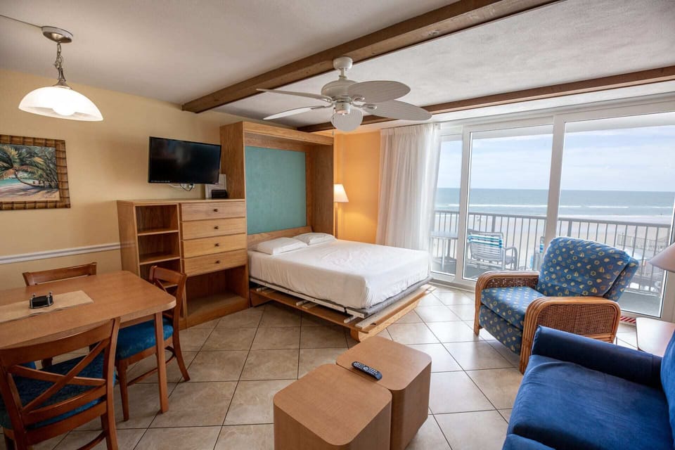 The convertible sofa bed adds flexibility to this oceanfront retreat, providing easy access to breathtaking views from the comfort of your bed.