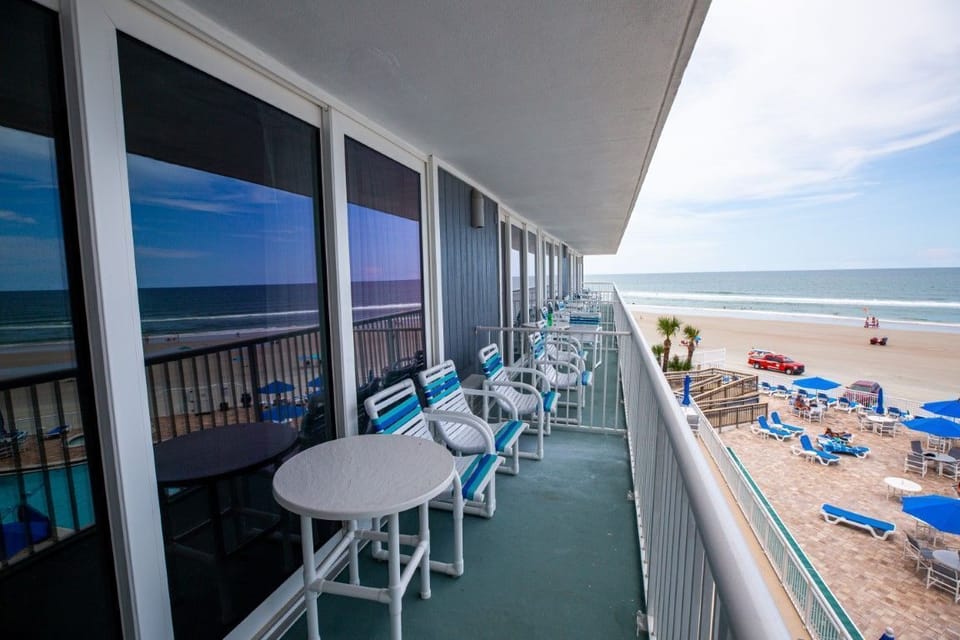 The private ocean-view balcony is an ideal spot for outdoor dining or simply soaking up the sun.