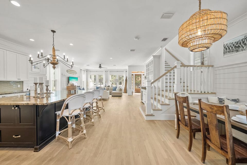 Open Living room, dining and kitchen area with ample seating for gathering
