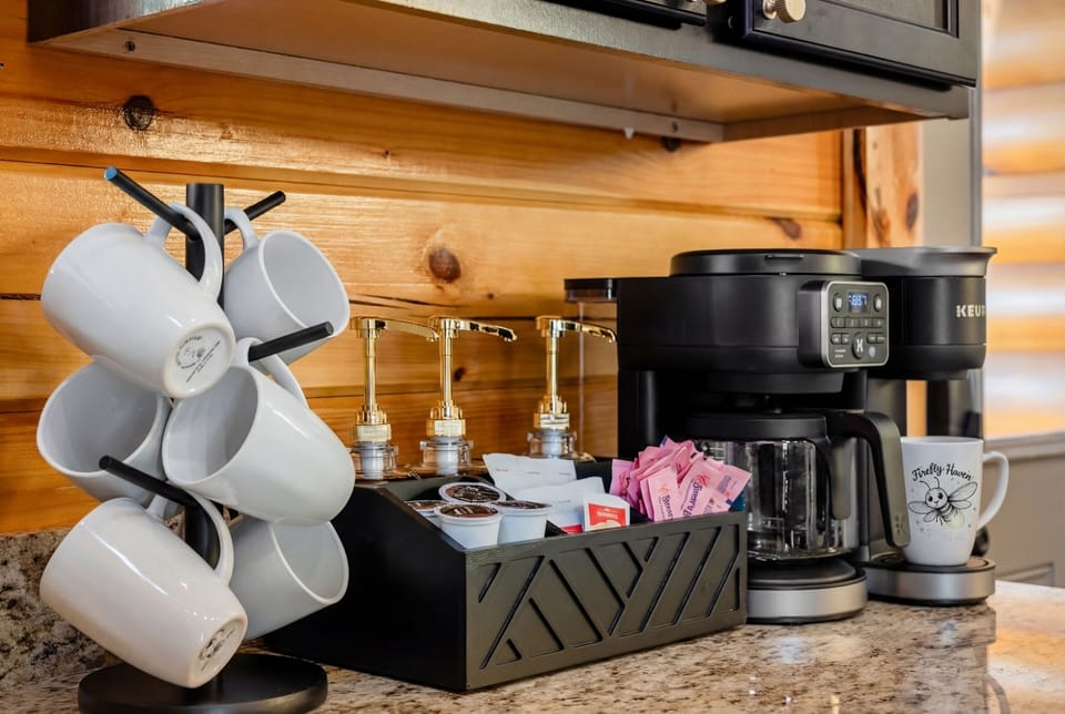Refuel coffee bar with Keurig, drip brewer, syrups & mugs.
