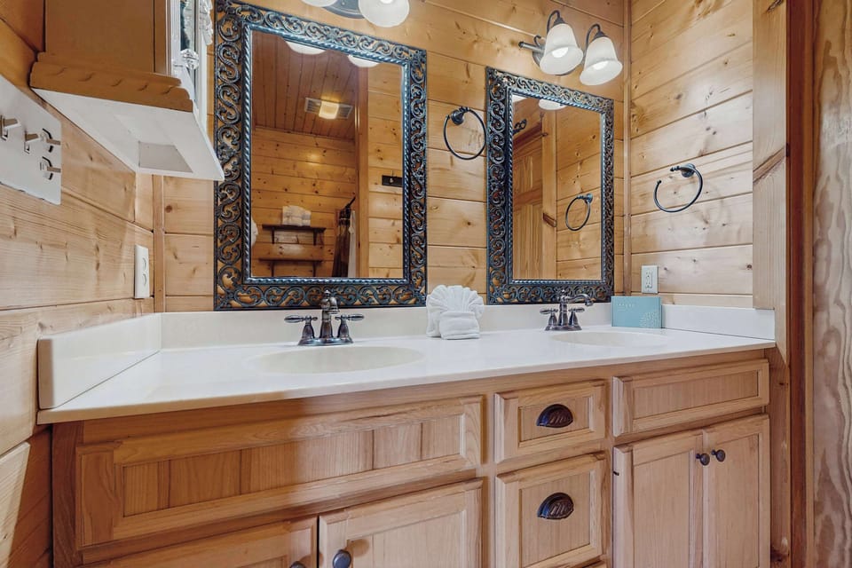 Elegant dual sinks and rustic charm await your revitalizing retreat!