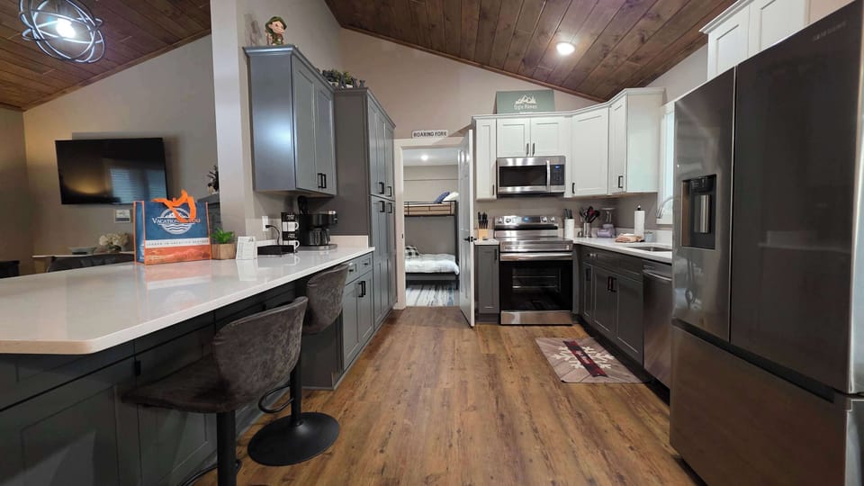 Whip up culinary delights in this modern space with stylish decor and ample amenities!