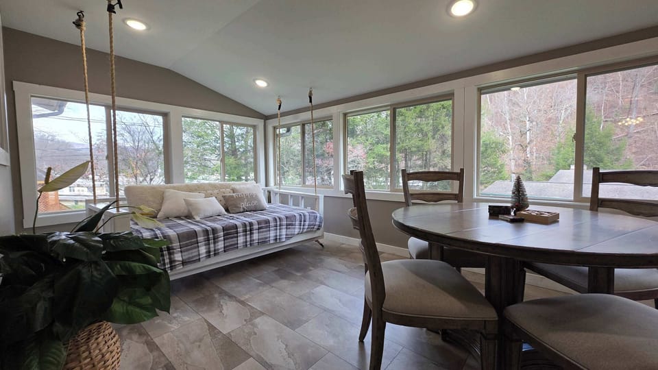 Bask in natural light with stunning views and comfy seating for relaxation!