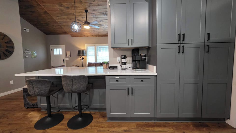 Enjoy modern appliances and ample seating for delightful meals and gatherings!
