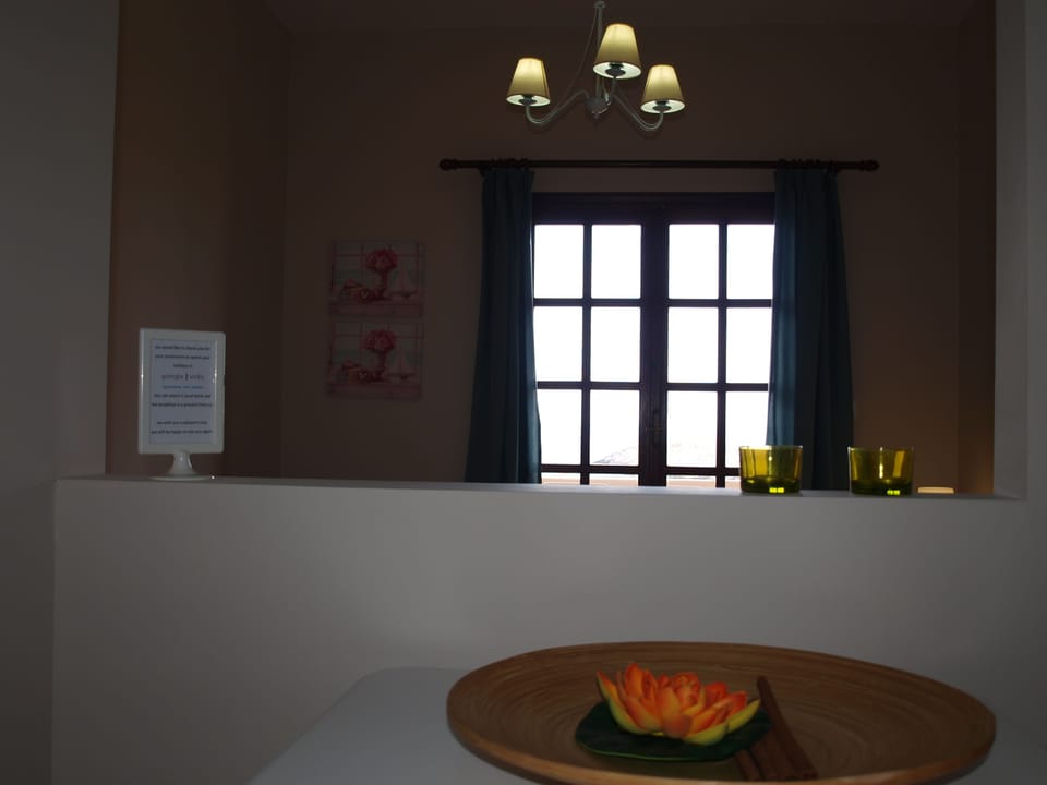 Apartment, 1 Bedroom, Sea View | In-room safe, iron/ironing board, free cribs/infant beds