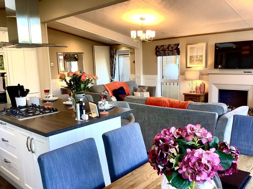 Large island and dining table for meal time gatherings.