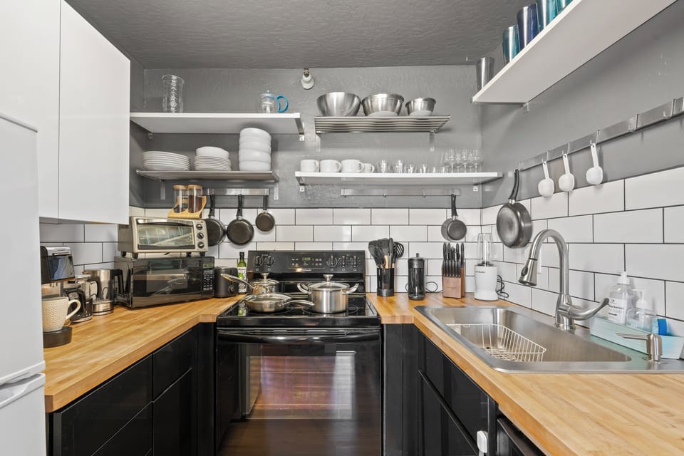 Our galley kitchen is fully equipped with all the amenities our guests could need. 