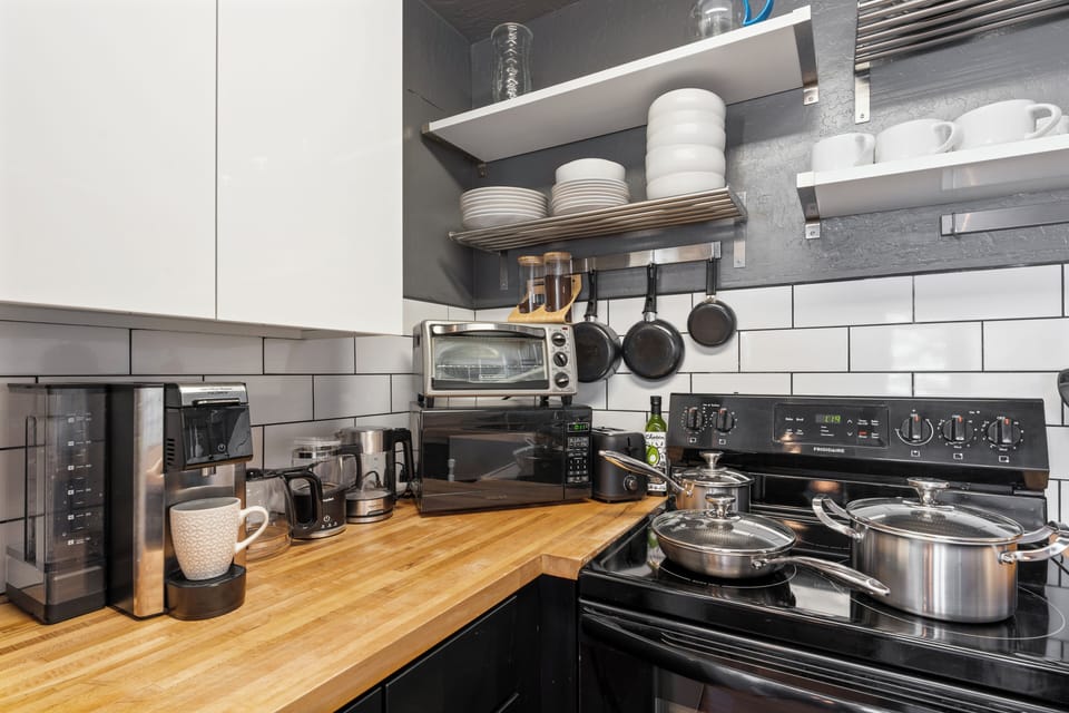 Our galley kitchen is fully equipped with all the amenities our guests could need. 