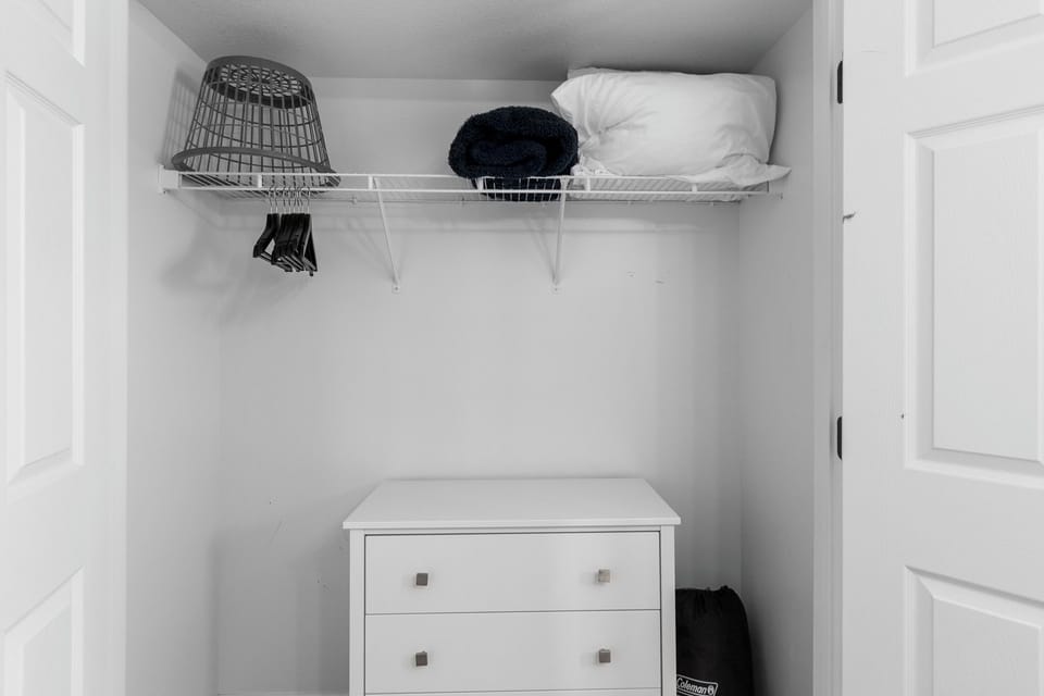 Bedroom 2 closet with Queen Air mattress, additional sheets/pillows/blanket