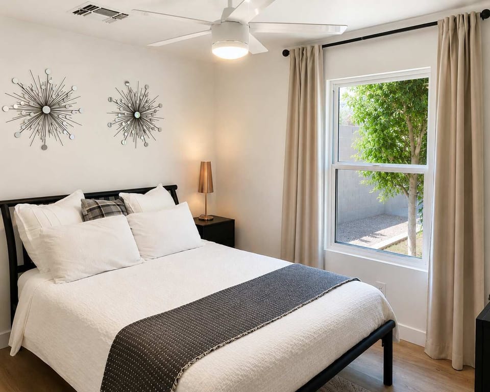 Designed with comfort in mind, the bedroom features a queen-size Casper mattress, premium linens, plush pillows, blackout curtains, and a tranquil setting for a restorative night's sleep.