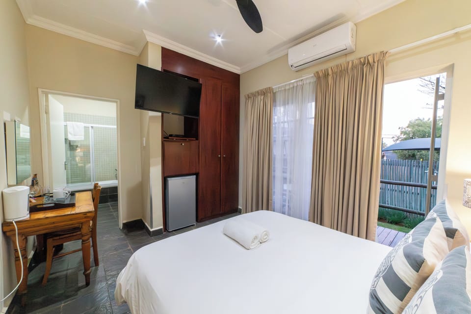 Standard Double Room, 1 Queen Bed, Private Bathroom | In-room safe, individually decorated, desk, free WiFi