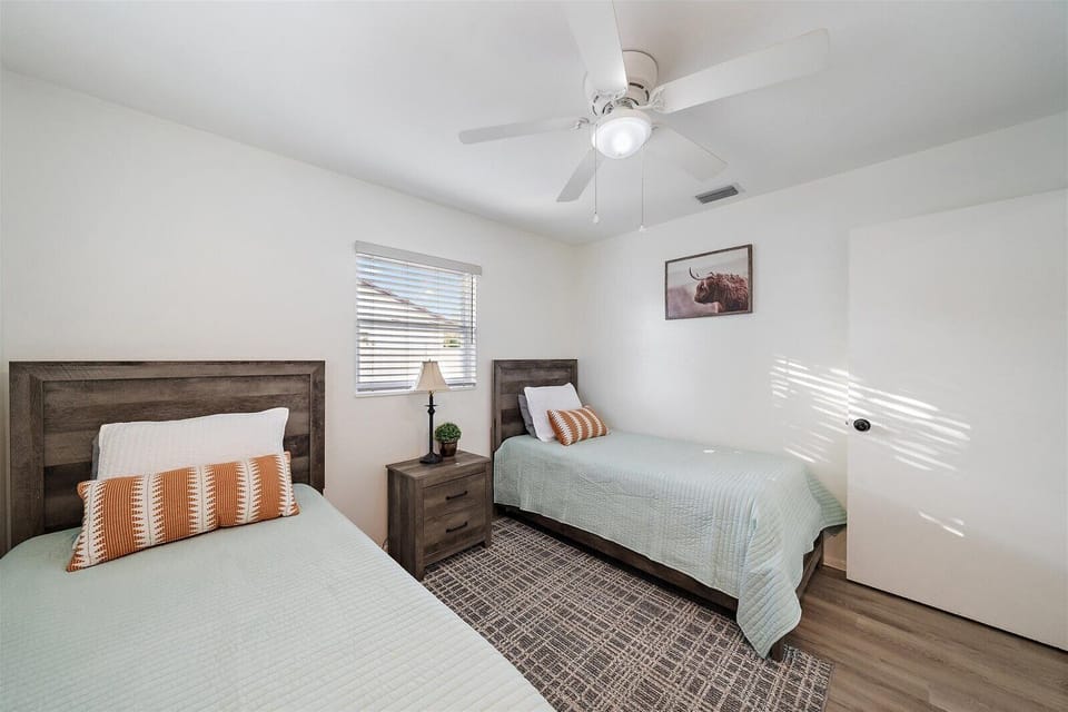 Bedroom 3 - Two Twin Beds with luxury linens provided.