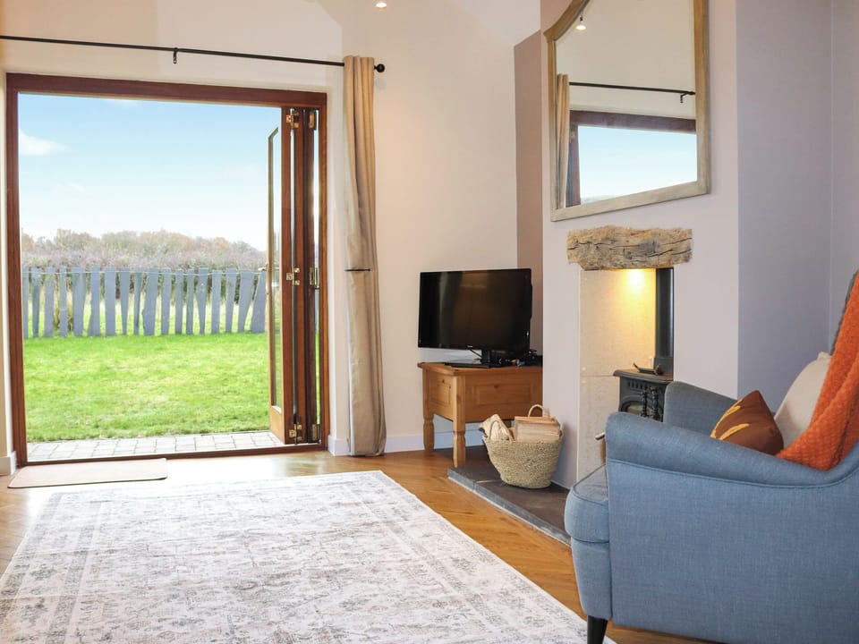 Living area | Beudy Newydd - Llwynpenddu Isaf Holidays, Llanllechid, near Bangor