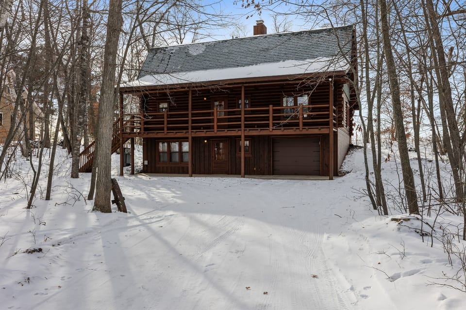 Classic log craftsmanship and a welcoming porch set the tone the moment you arrive. Beautifully designed for modern travelers, the home also features a dedicated electric vehicle charger. You can settle in, plug in, and enjoy the stay!