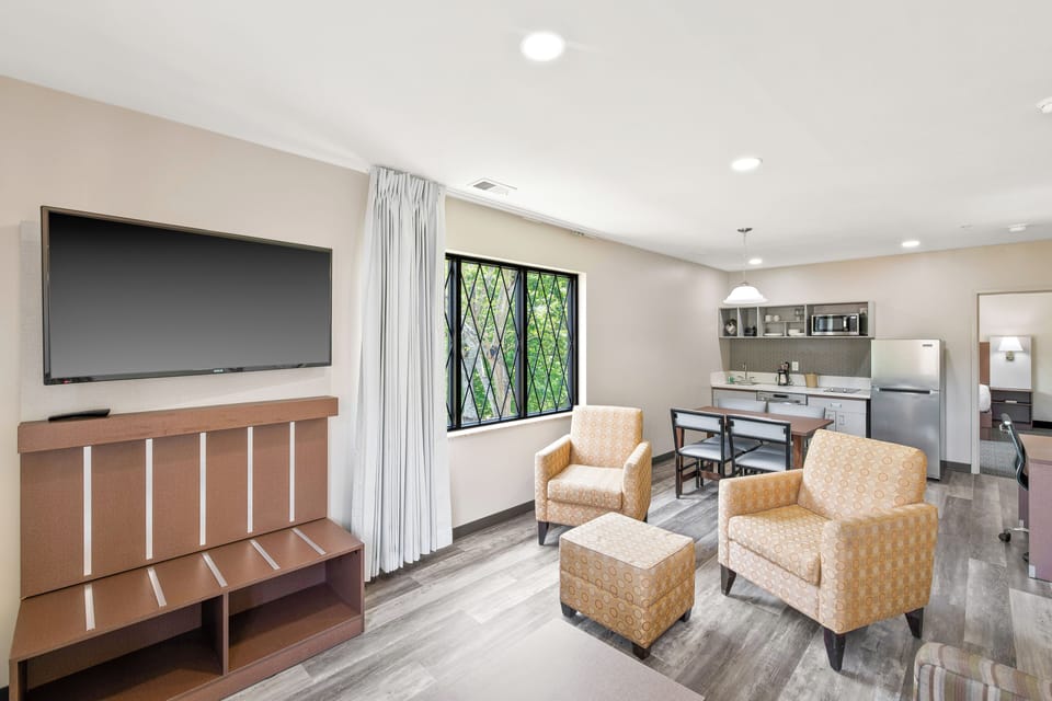 Family Suite, 2 Bedrooms | Desk, laptop workspace, soundproofing, iron/ironing board