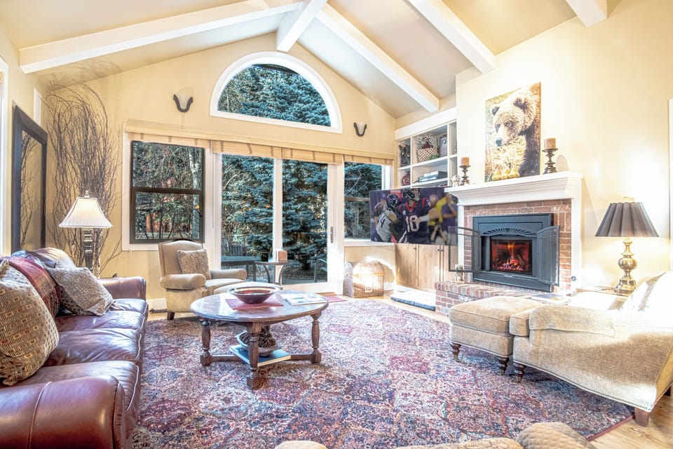 Cozy Living Room with Fireplace & Patio Access
