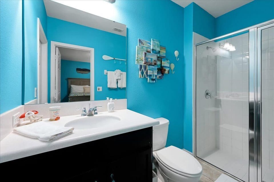 Enjoy the convenience of your own private bathroom, featuring modern fixtures, ample vanity space, and a clean, refreshing aesthetic.