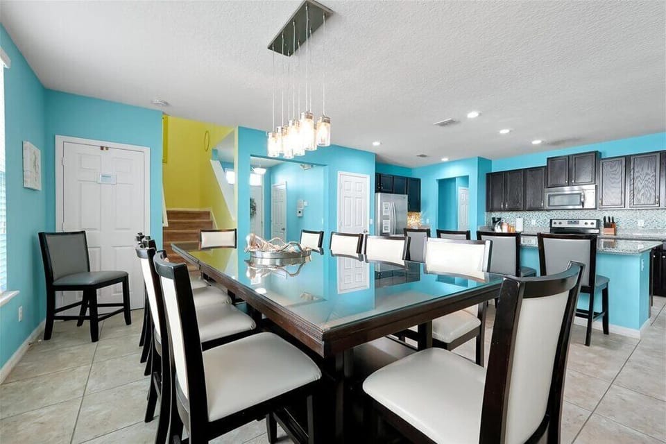 Our expansive dining area is designed for togetherness, offering ample seating for the whole group to enjoy home-cooked meals from the adjacent fully stocked kitchen.